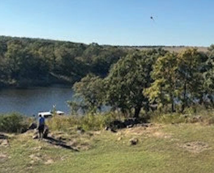 A wooded lakeshore at Camp Wah-Shah-She