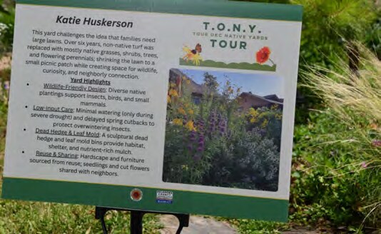 A garden sign describing the homeowner and their native plants
