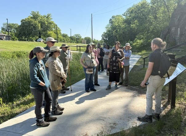 A group walking a paved trail